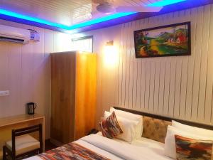 Letto o letti in una camera di Hotel Bamboo Castle