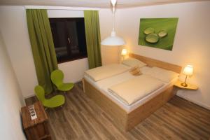 Giường trong phòng chung tại Hotel Berghof