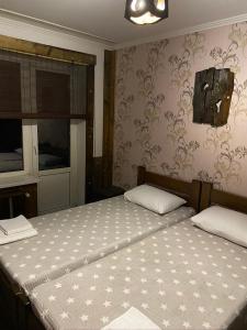 Letto o letti in una camera di Yulita