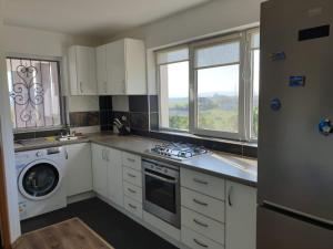 Kuchyň nebo kuchyňský kout v ubytování Lidia House