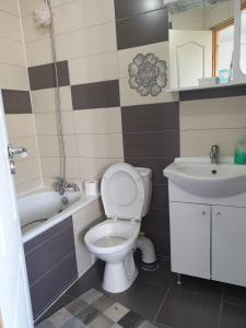 Koupelna v ubytování Lidia House