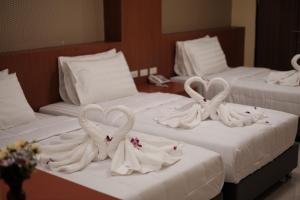 Krevet ili kreveti u jedinici u objektu Rest@Ratchada hotel