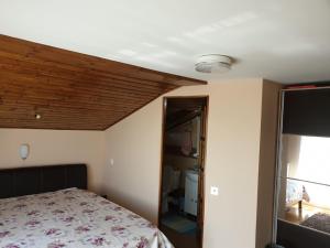 Postel nebo postele na pokoji v ubytování Lidia House