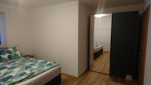 Postel nebo postele na pokoji v ubytování Ferienhaus Reiter Jochberg bei Kitzbühel