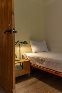 Postel nebo postele na pokoji v ubytování Cozy House Hostel