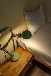 Postel nebo postele na pokoji v ubytování Cozy House Hostel