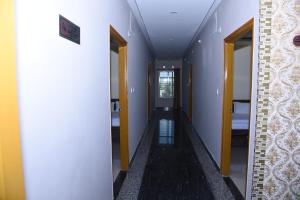 Postel nebo postele na pokoji v ubytování Yashas Paradise