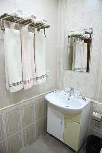 Koupelna v ubytování Hotel Gold