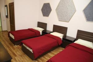 Postel nebo postele na pokoji v ubytování Hotel Gold