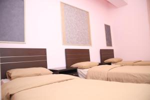 Postel nebo postele na pokoji v ubytování Hotel Gold