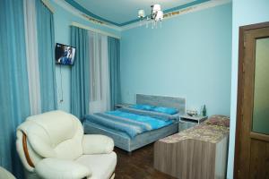 Postel nebo postele na pokoji v ubytování Hotel Gold