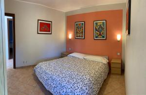 A bed or beds in a room at Al Borgo