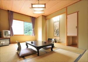 TV a/nebo společenská místnost v ubytování Bouzantei Kotobuki