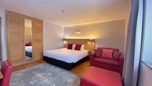 Postel nebo postele na pokoji v ubytování Hotel Côté Cour + 37 fotografií