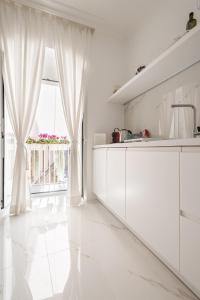 Kuchyň nebo kuchyňský kout v ubytování Porta Piccola Luxury Home