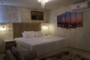 Postel nebo postele na pokoji v ubytování Pak Suítes Hotel + 37 fotografií