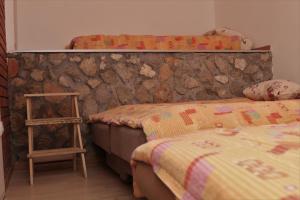 Lova arba lovos apgyvendinimo įstaigoje Apartmani Zeravica Jahorina
