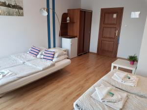 Postel nebo postele na pokoji v ubytování Balaton Rowy