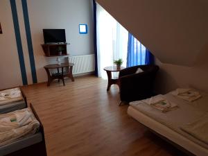 Postel nebo postele na pokoji v ubytování Balaton Rowy