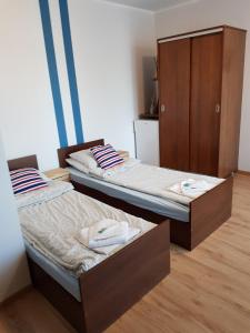 Postel nebo postele na pokoji v ubytování Balaton Rowy