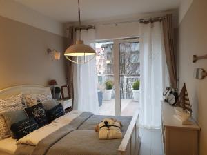 Posteľ alebo postele v izbe v ubytovaní Apartament Prestige & Sea Playa Baltis 44