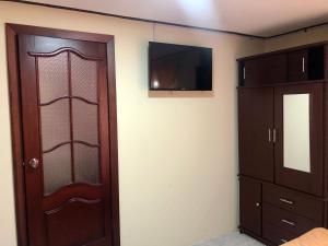 TV a/nebo společenská místnost v ubytování Hotel Casa Santa Lucía