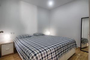 Cama o camas de una habitación en EL Mojon Beach Apartment