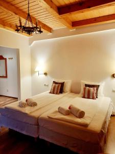 Säng eller sängar i ett rum på Vila Eivissa