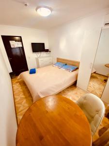Postel nebo postele na pokoji v ubytování Esentai Hostel