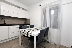 Kuchyňa alebo kuchynka v ubytovaní Apartment ARCHIE