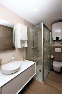 Kúpeľňa v ubytovaní Apartment ARCHIE + 26 fotografií