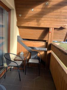 Posedenie v ubytovaní Apartament Skandynawska Prostota z basenem i sauną