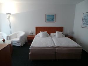 Postel nebo postele na pokoji v ubytování Haus Köbesine