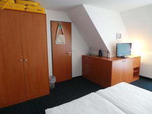 Postel nebo postele na pokoji v ubytování Haus Köbesine