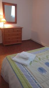 A bed or beds in a room at El Molino de la laguna