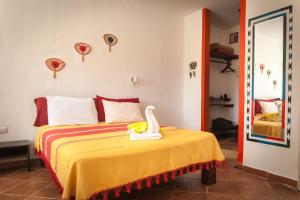 Postel nebo postele na pokoji v ubytování Casa Don Diego