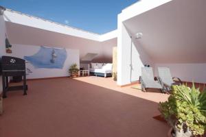 a living room with a couch and a table at Horizonte - Apts IAN Jandía Sur in La Lajita