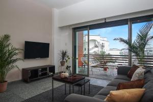 Télévision ou salle de divertissement dans l'établissement Infinito by Zamá Homes