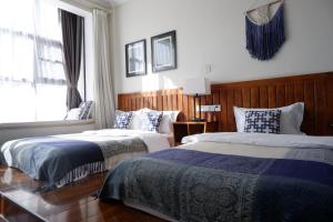 Rúm í herbergi á Dali Yunxi Boutique Inn