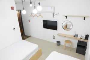 TV a/nebo společenská místnost v ubytování Minihotel Poongdaengi