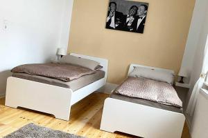 Postel nebo postele na pokoji v ubytování Gemütliches 3-Zimmer Apartment