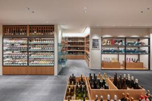 a store filled with lots of bottles of wine at Grand Walkerhill Seoul in Seoul