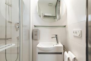 Kúpeľňa v ubytovaní Apartamentos y estudios céntricos Conil Home Suite + 37 fotografií