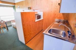 Dapur atau dapur kecil di Res.Albarè/Solaria Apt.Solandra