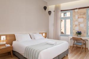 Postel nebo postele na pokoji v ubytování Hotel Off