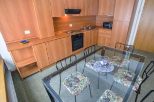 Dapur atau dapur kecil di Res.Albarè/Solaria Apt.Solandra