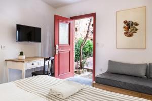 TV a/nebo společenská místnost v ubytování Hotel Off