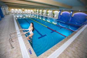 The swimming pool at or close to AquaSun Family Hotel