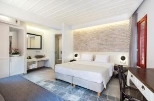 Postel nebo postele na pokoji v ubytování Hotel Off