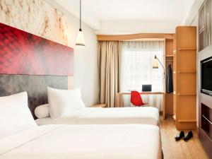 Кровать или кровати в номере ibis Yogyakarta Adi Sucipto